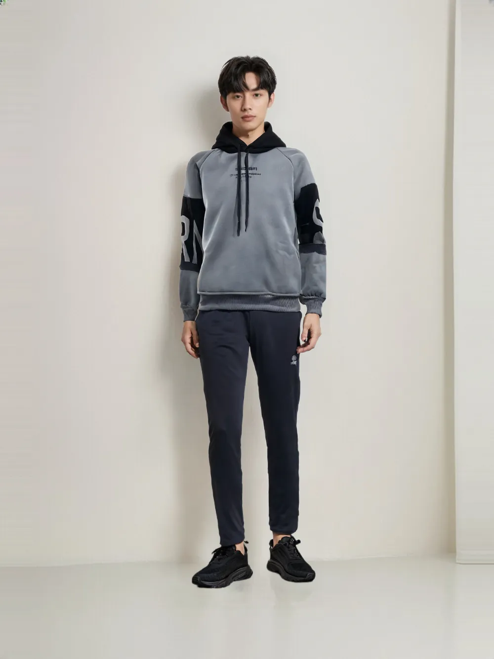 HOD25002 Unisex 100% Polyester Classic Hoodie in Black and Grey with Bold Print on Sleeve